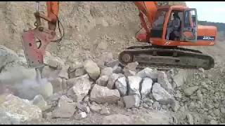 Rock breaker on DH220