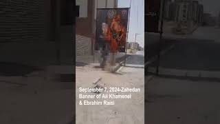 Protesters torch poster of Ali Khamenei and Ebrahim Raisi in Zahedan | Iran protests