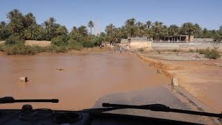 Mercedes 613D crossing a flooded bridge in Morocco