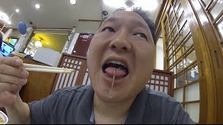 Eating live Octopus - Seoul Fish Market