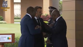 Macron was cleaning the shoulder of the Minister of Foreign Affairs of Benin