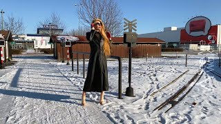 Leather coat and Snakeskin Boots in snow