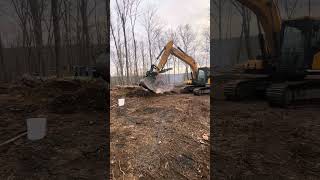 excavator covers up fire pit Hyundai 160