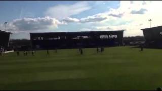 Wigan fans and players at full time vs Shrewsbury