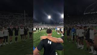 Fijian and New Zealand boys singing together after the match.