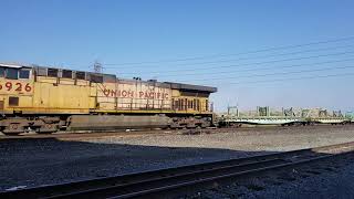 UP 6925 leads a westbound MOW train through Mira Loma