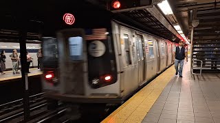 MTA NYC Subway: R160 (F) Train departing Jackson Heights-Roosevelt Ave