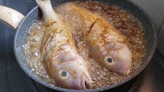 Asian daily food fried fish with sauteed spinach is very easy