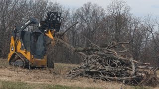 John Deere 317G Skid steer with the Danuser Intimidator Tree Puller - Building a Weekend Bonfire