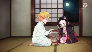 Zenitsu shows fish to Nezuko