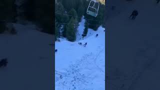 Snowboarder falls and takes down the whole lift