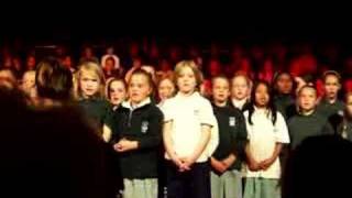 Tori Singing with School Choir