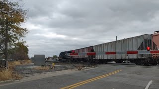 stopped by a Norfolk Southern Grain Train I'm assuming potash? im not sure