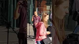 Russian busker singing a popular song in Covent Garden