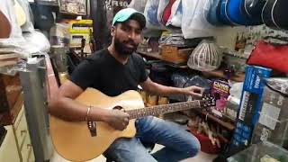 How to tune a guitar with tunner perfectly..(sundram music house)