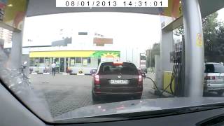 Woman on gas station