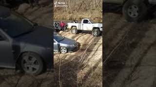 Car gets stuck in creek crossing