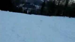 Snowboarding down a slope (1st person view)