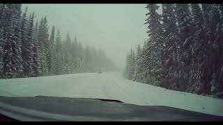 A snowy drive through the mountains - 1