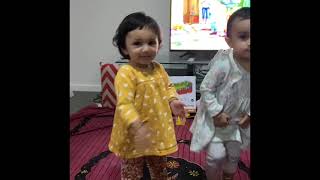 Avani and Evani playing, dancing and fighting