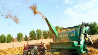 Thresher Cleans Rice Crop!