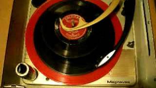 1961 Magnavox Micromatic portable record player - in action