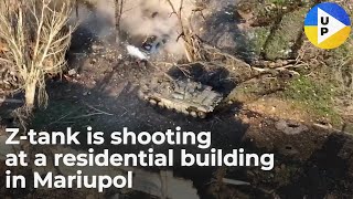 Russian Z-tank is shooting at a residential building in Mariupol