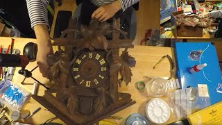 Taking apart a really old cuckoo clock.