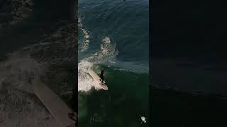 Dylan Delaney multitasking…walking the board WHILE giving out wig adjustments… #surfing #dronevideo