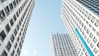 Skyscrapers against the blue sky. Frame. View from below