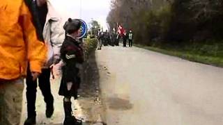 Young Boy Salutes Troops