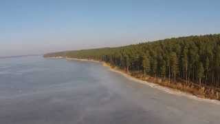 Drone flight above ice on Kaunas lagoon, Lithuania. Skrydis dronu virš marių ledo