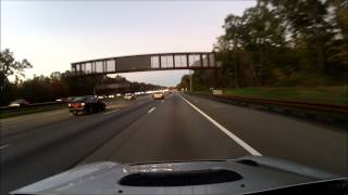 High horsepower Subaru WRX with hood exit exhaust cruising NJ