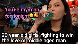 Nightlife in rural Thailand, 20 year old girls' fighting to win the love of middle aged man