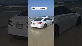 Abandoned Car stuck on the beach