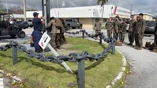 U.S. Marines raise flag over U.S. Coast Guard Forces Micronesia