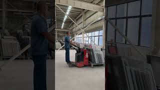 Transporting and transferring the already cut marble slabs by riding and operating forklift