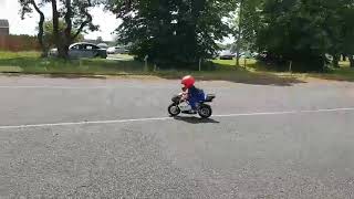 3.5 year young Christopher on a petrol bike