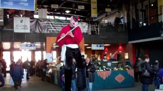 Stilt Walker Flautist at Marché Jean Talon Market Montreal Feb. 19, 2012