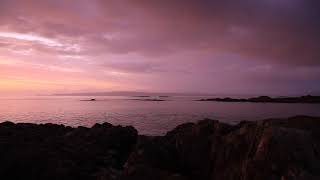 Sunset Silversands, Arisaig view towards isles of Eigg, Rum and Skye