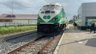 Guelph Go Train reflections of some bodacious babes reflecting off of that train