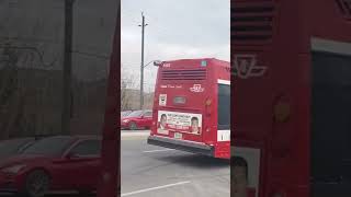 Two TTC Nova Bus LFS #8450 and #3203 on St. Clair Avenue East near Warden station