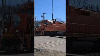 EJ&E 703 GP38-2 leads with CN 9574 GP40-2LW on a local job in Wisconsin 2/18/2024