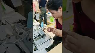 She is repairing a sewing machine and Sewing Overlock Machine