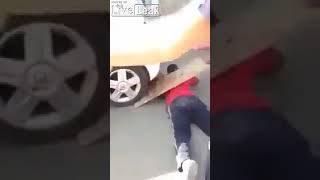 Guy volunteers for car to drive over him