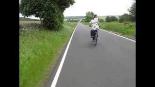 Carlota Bicycling in the Peak District, UK