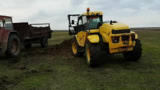 New Holland LM430 vs. 300 tone trash.UTB 650+MIG 6T