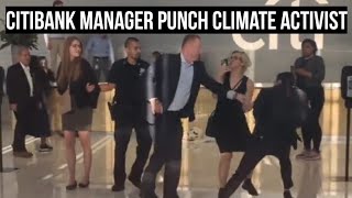 Citibank staff punch climate activist in the face for taking video. #climateactivist