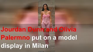 Jourdan Dunn and Olivia Palermno put on a model display in Milan