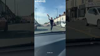 Barber Conducts Traffic With Rainbow Feather Duster After Traffic Lights Died || Dogtooth Media